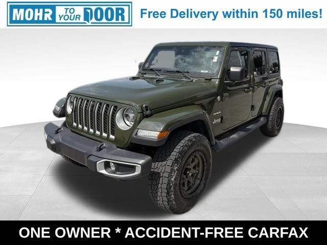 2022 Jeep Wrangler Unlimited Sahara in Sarge Green Clear — front three-quarter view