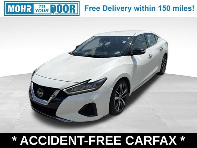 2022 Nissan Maxima SV in Pearl White Trico — front three-quarter view